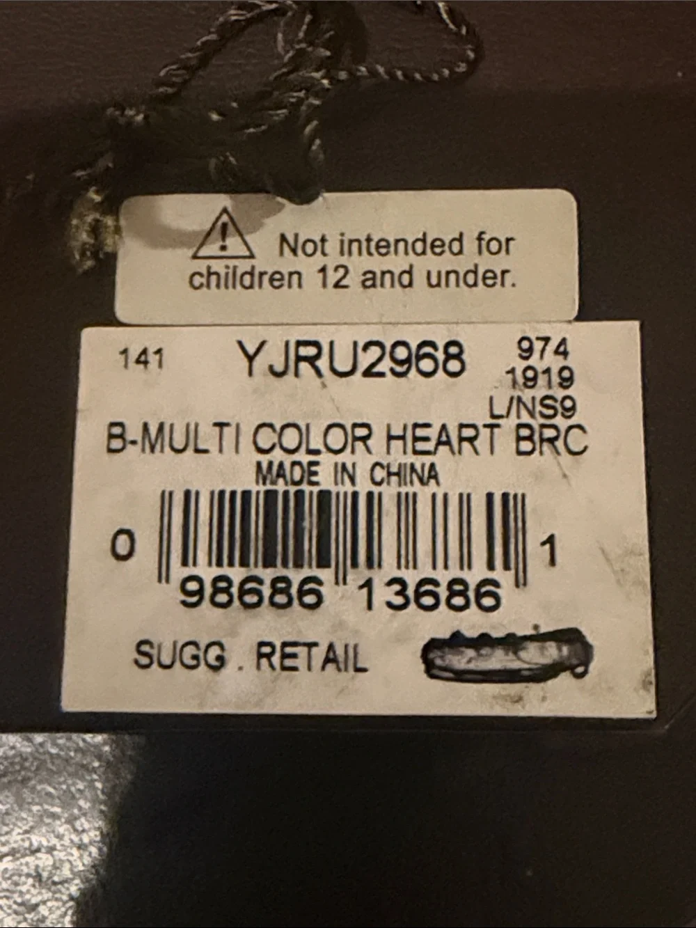 Juicy Couture Multi-Heart Bag Charm in Black, Yellow, Teal, Cream, Brown-